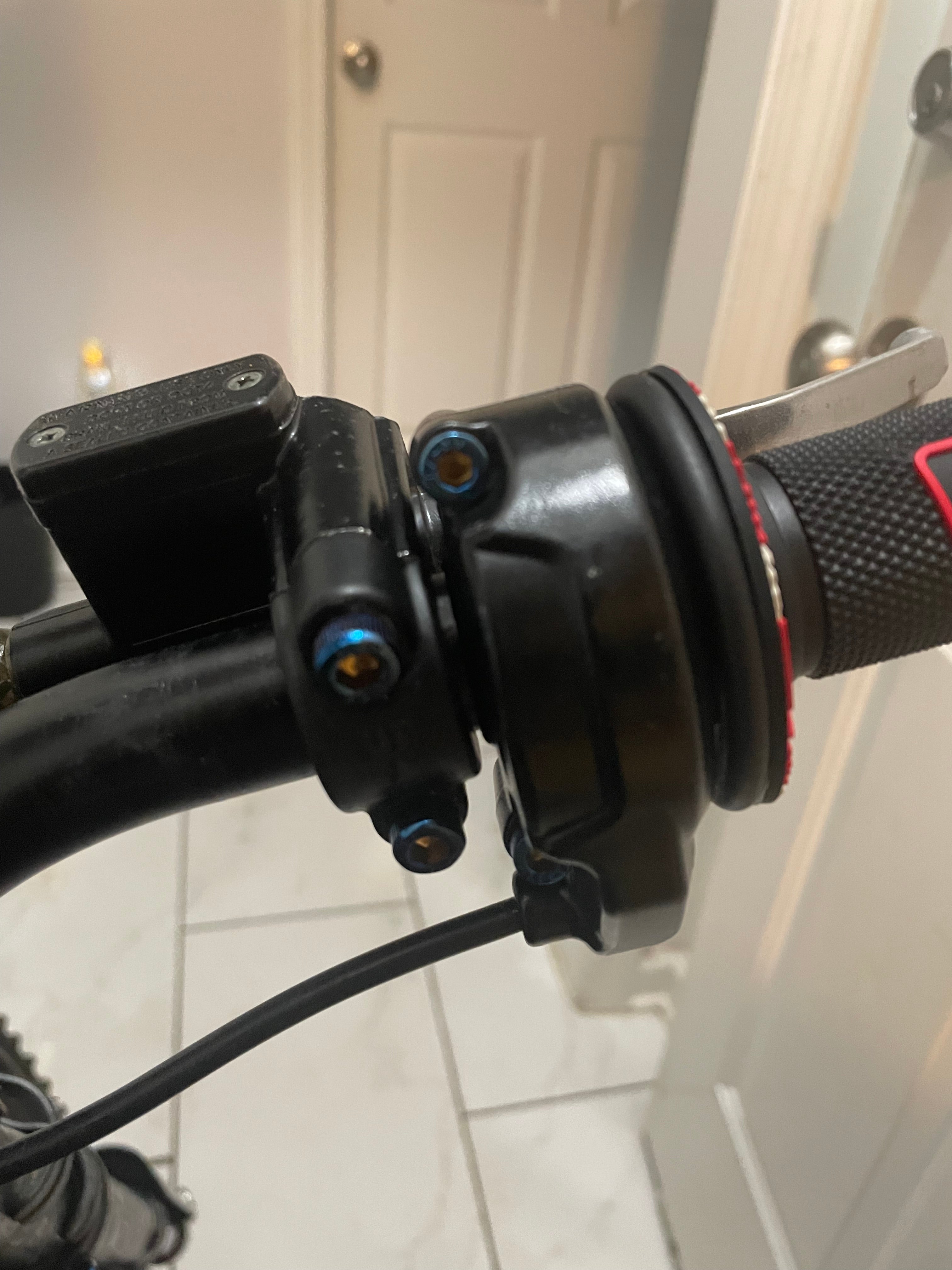 Surron throttle titanium bolts